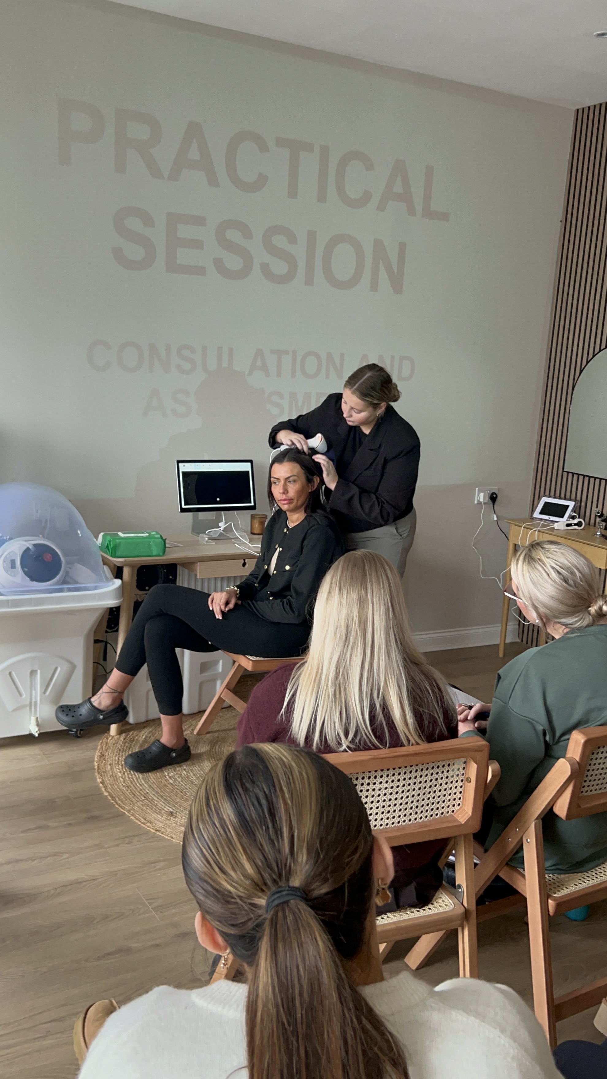 Scalp analysis demonstration during Japanese Head Spa training course in the UK
